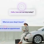 Mechanic using car repair software with AI