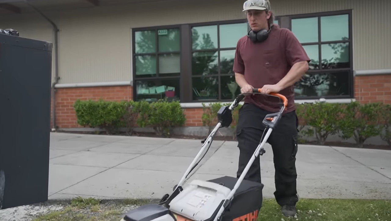Technician using lawn care software on a tablet