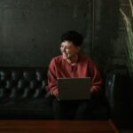 Software engineer working on multiple monitors