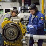 Automotive Technician Using Diagnostic Software