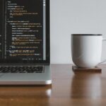 Coding With Coffee On A Desk