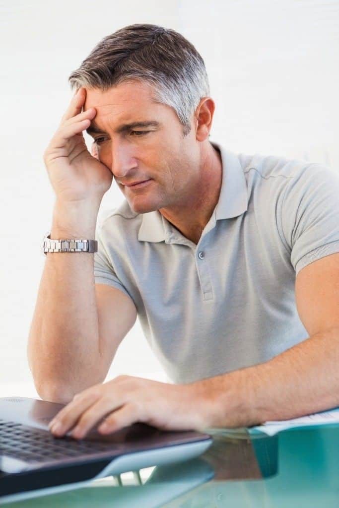 An image showing a lead developer mentoring a team member, illustrating support and growth.