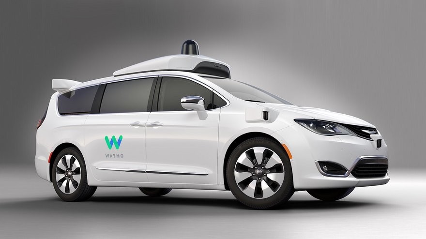 Waymo self-driving car navigating city streets