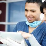 Healthcare staff collaborating using employee experience software