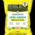 Bag of Jonathan Green Annual Lawn Care Program for Acidic Soil, part of the Jonathan Green Annual Lawn Care Program, with product information and a residential backdrop.