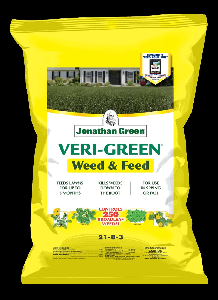 Bag of Jonathan Green Annual Lawn Care Program for Acidic Soil, part of the Jonathan Green Annual Lawn Care Program, with product information and a residential backdrop.