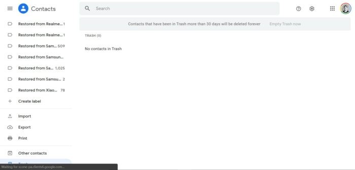 Google Contacts interface showing the Trash folder and options to restore deleted contacts