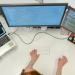 Automotive engineer uses a computer for diagnostics